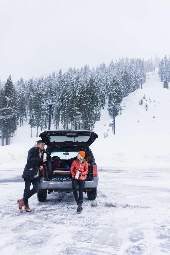https://unsplash.com/photos/woman-with-man-standing-near-suv-1NCcWi24FRs